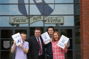 Employment and Learning Minister Dr Stephen Farry with students from Hazelwood Integrated College